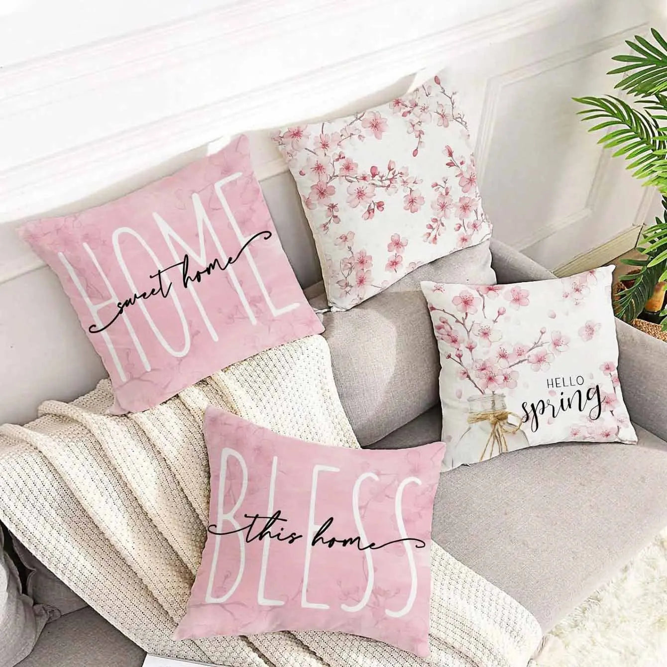 Square short velvet cushion cover with cherry blossom and letter print, 45cm, shown in one of four available colours.