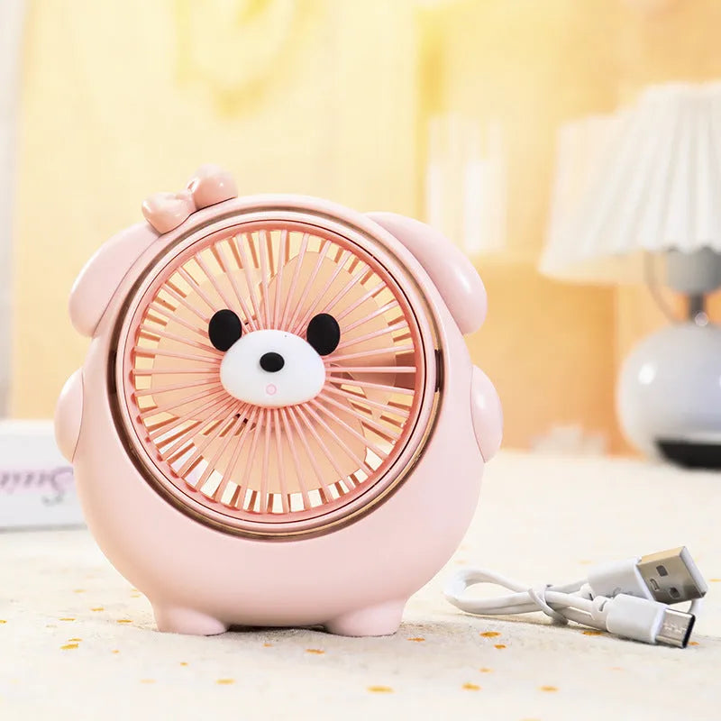 Desktop USB electric fan with cute dog design showing six colour options including bear brown and pink puppy variations