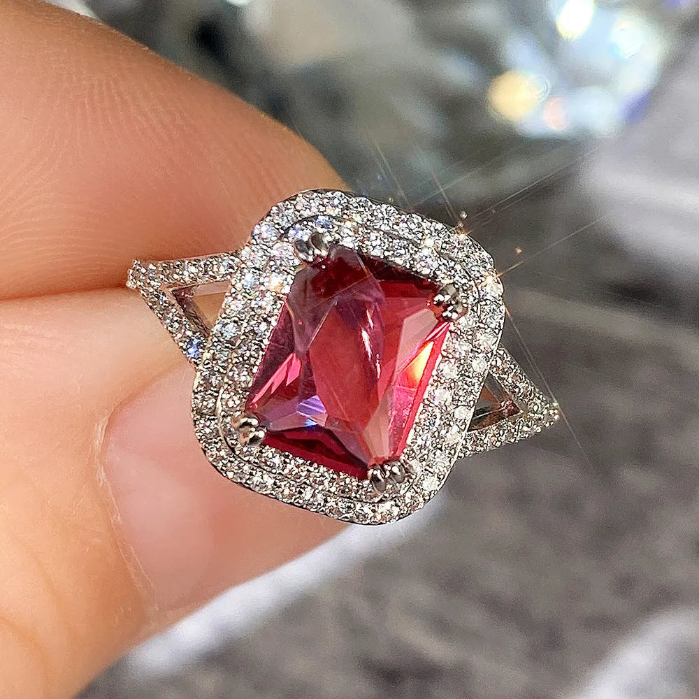 Copper square princess ring with rhinestone centre in F827 red colour, shown in geometric profile