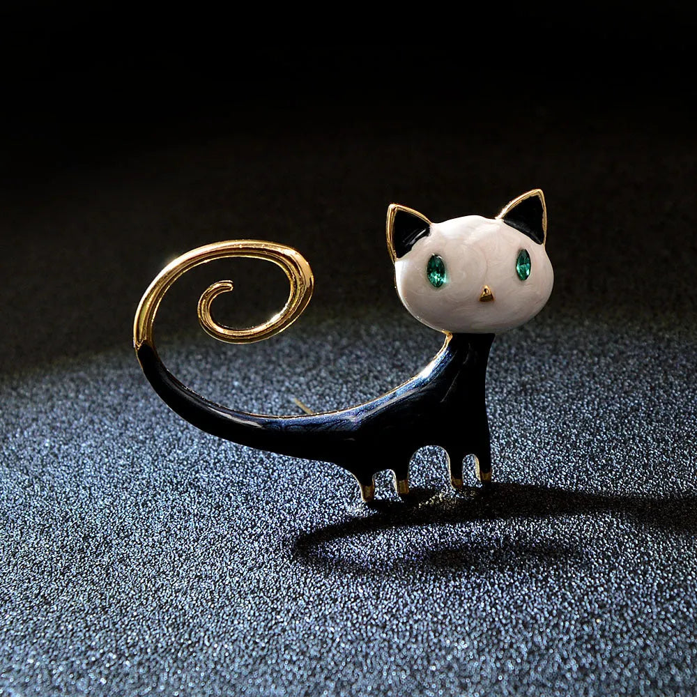 Personalised painted cat tailing up brooch in alloy metal available in white or orange colours