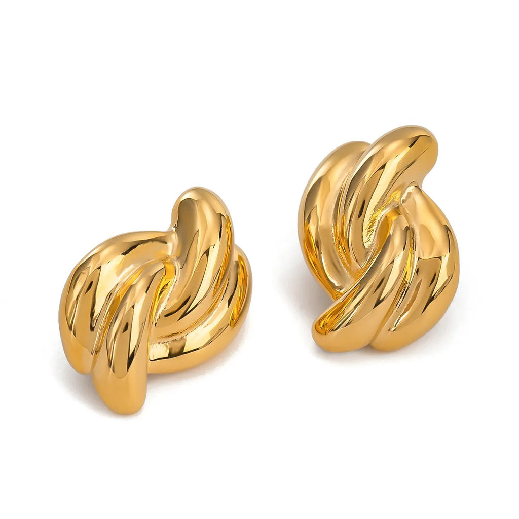 Close-up of women's stainless steel cross-knotted geometric earrings with electroplated finish, 1.5 cm diameter