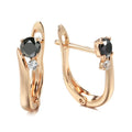 Gold drop earrings with black geometric stones in retro style design