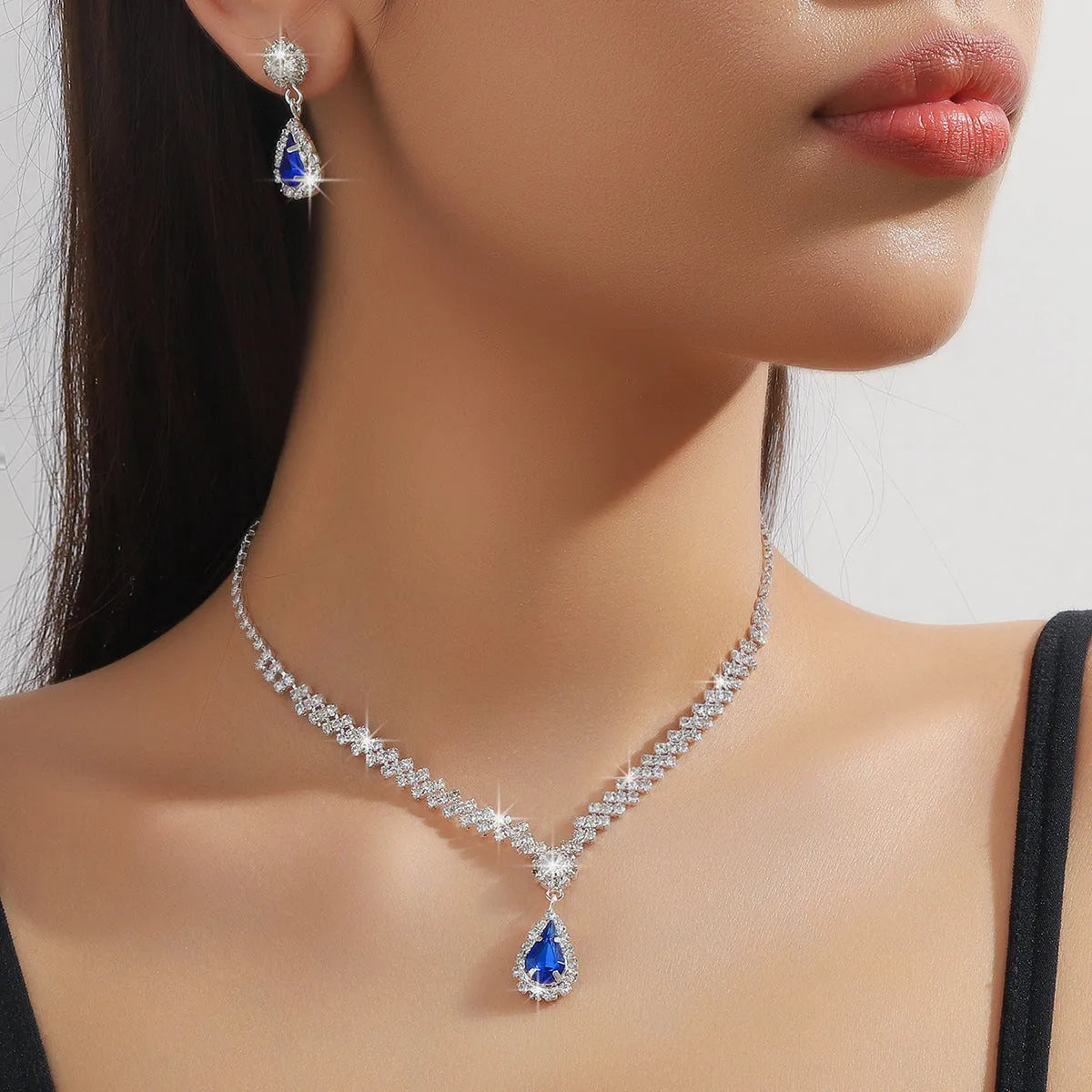 Claw chain rhinestone jewellery set with water drop design in multiple colour options