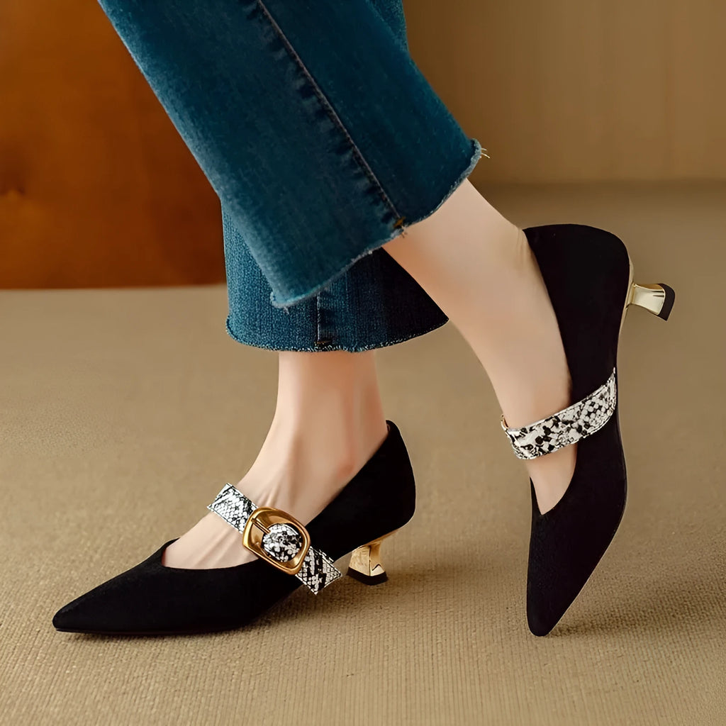 Black French pointed stiletto high heels for women with a buckle strap closure.