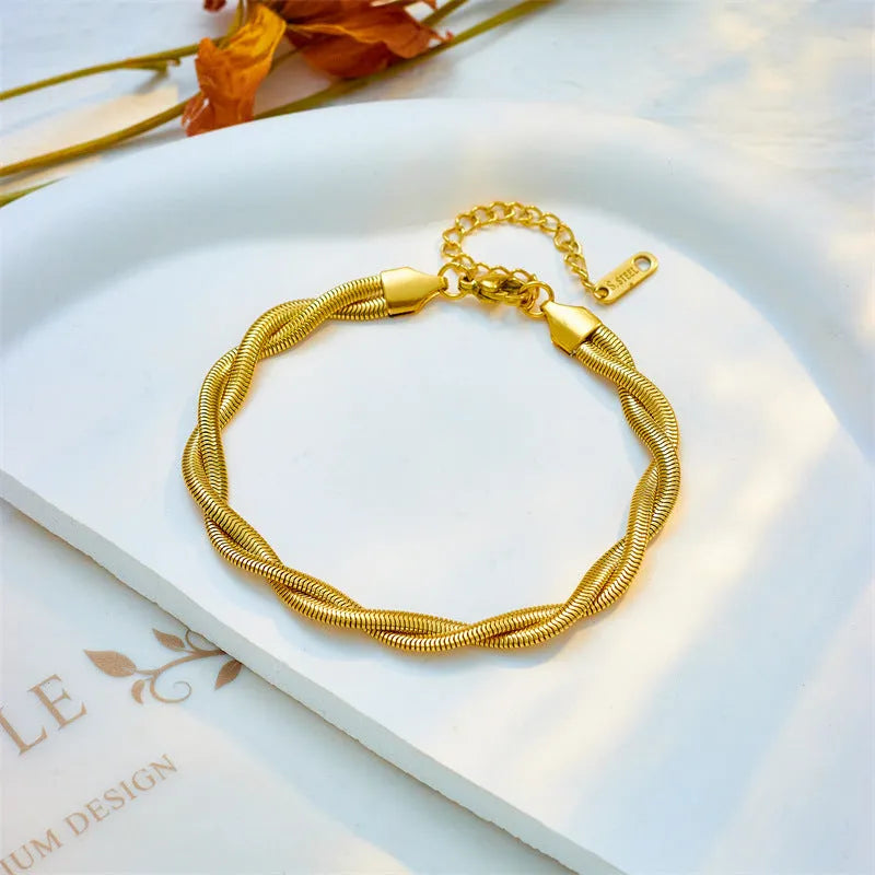 Simple neutral woven twisted gold-plated necklace and bracelet set on titanium steel chain