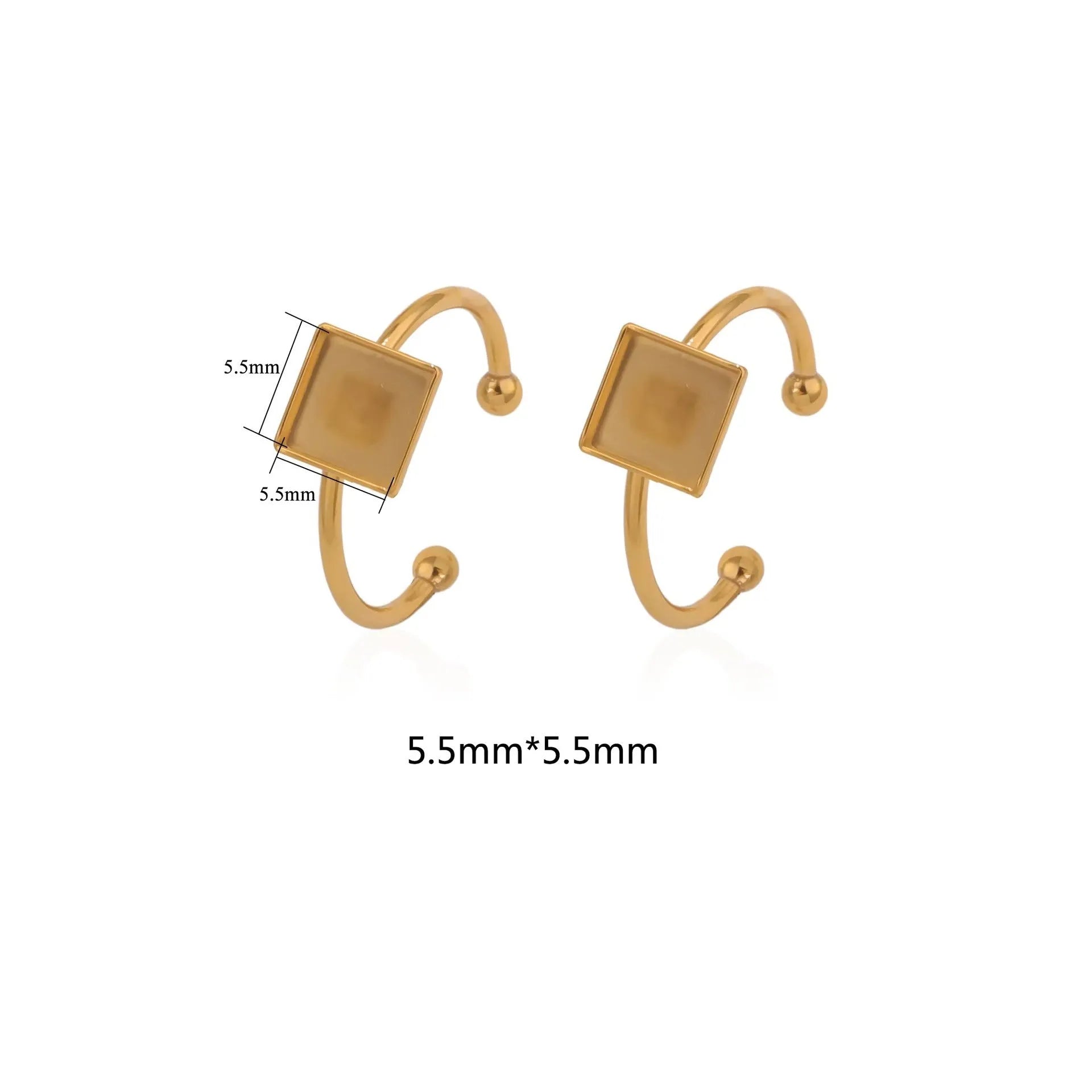 Assortment of golden stainless steel DIY jewellery settings in oval, heart, round, square, and rectangle shapes with totem pattern.
