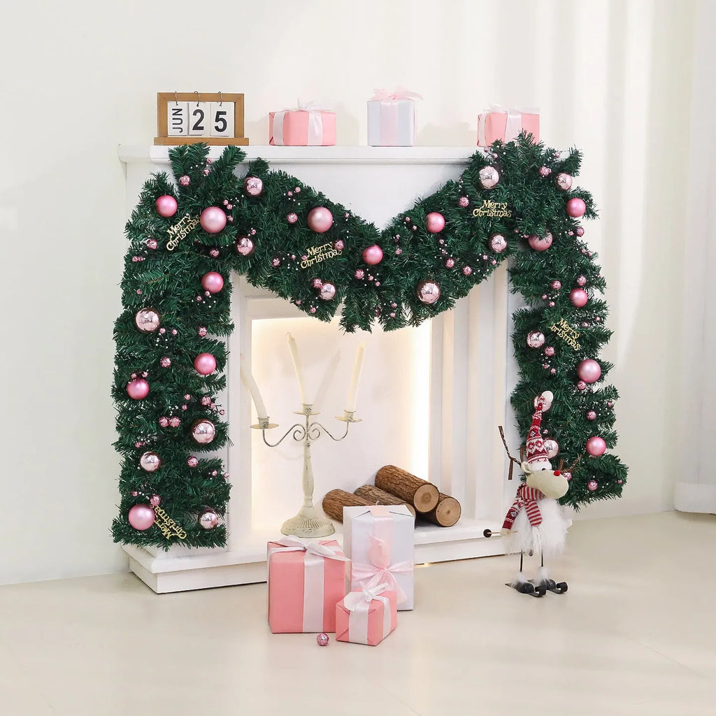 2.7 metre pink artificial rattan Christmas vine decoration with small fruit accents and LED lights