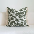 Green botanical pattern hotel sample pillow with tassel detail on linen cotton cover