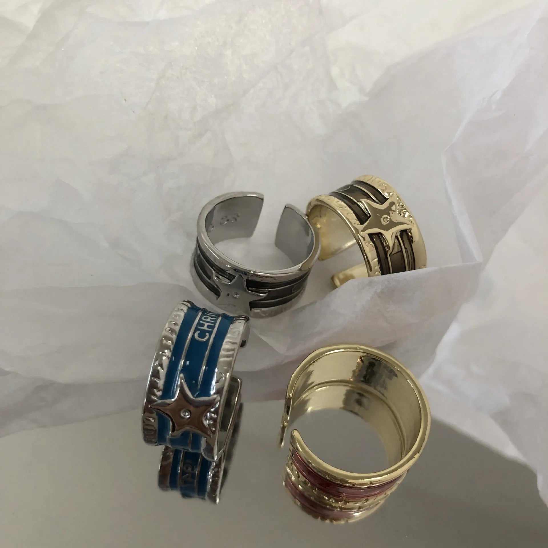 Adjustable geometric copper ring with distressed finish in choice of colours.