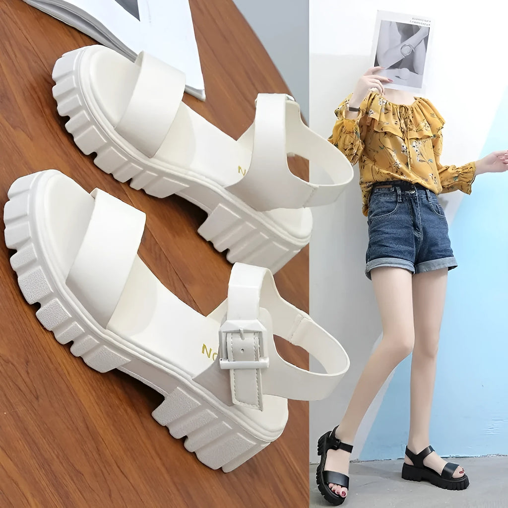 Women's beige peep toe platform sandals with ankle-strap buckle on foot