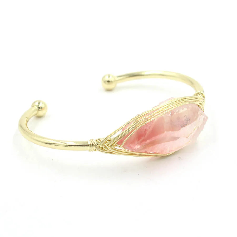 Natural raw gemstone crystal bracelet in ethnic style with simple opening, shown in one of nine colour options.