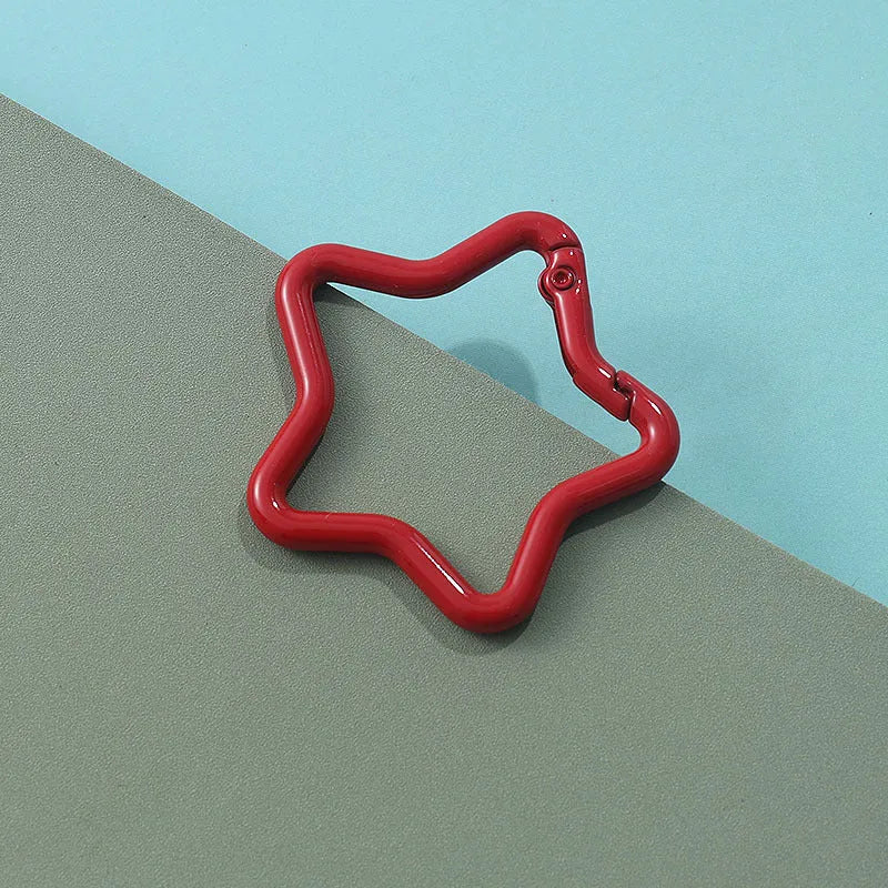 Zinc alloy five-pointed star keychain in multiple colour options for bag decoration