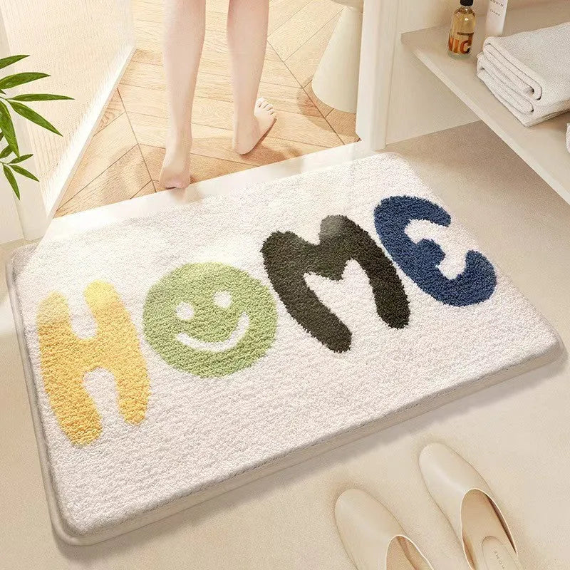 Sky sea coloured square rug with rainbow pattern, showing flat imitation cashmere texture and plastic bottom.