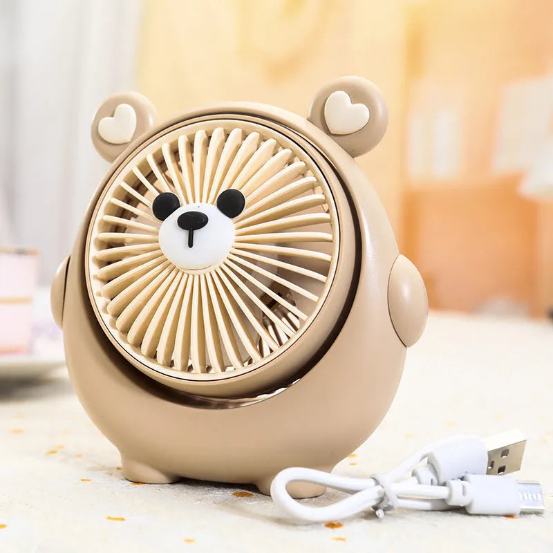 Desktop USB electric fan with cute dog design showing six colour options including bear brown and pink puppy variations