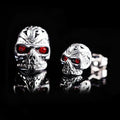Retro red eye skull stud earrings with alloy metal construction and gemstone inlays