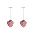 Women's geometric strawberry earrings with spot drill detail in red zinc alloy.