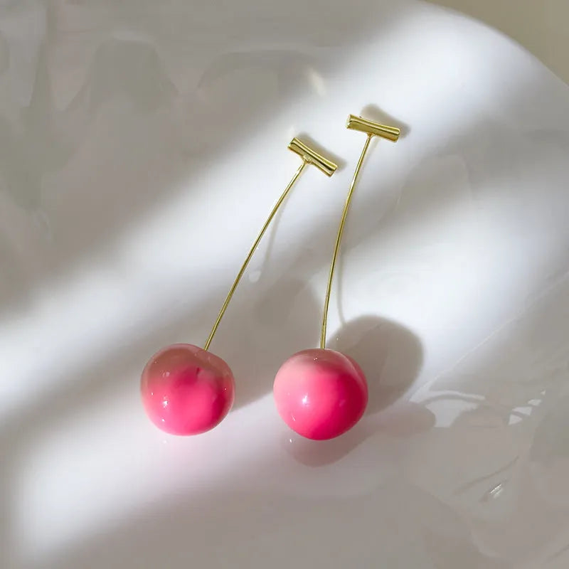 Women's acrylic peach fruit earrings in two colour styles with copper earring findings