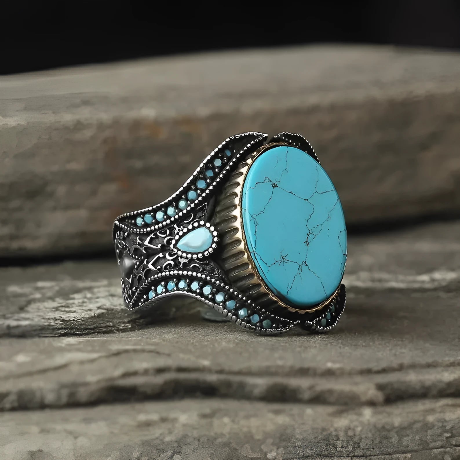 Men's antique silver alloy round band ring showing simple turquoise colour on finger