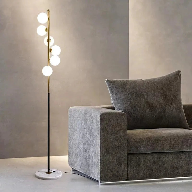 Modern minimalist floor lamp with wrought iron glass construction and adjustable lighting
