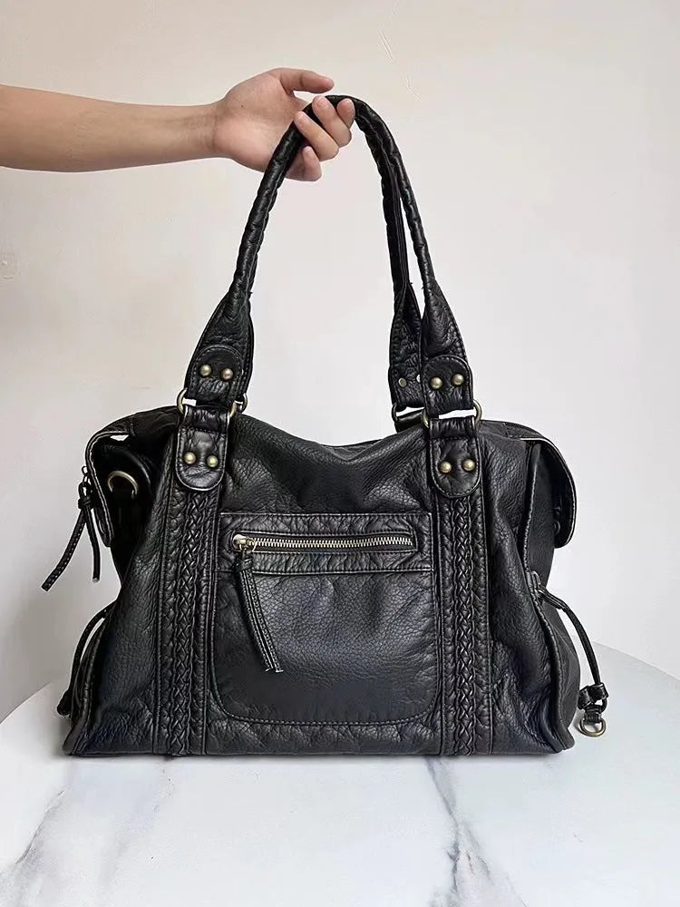 Women's brown retro soft PU messenger bag with woven detail and a single shoulder strap