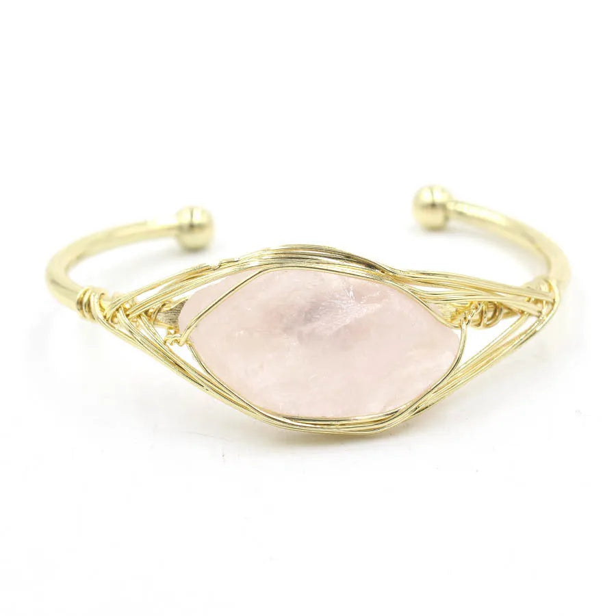 Natural raw gemstone crystal bracelet in ethnic style with simple opening, shown in one of nine colour options.