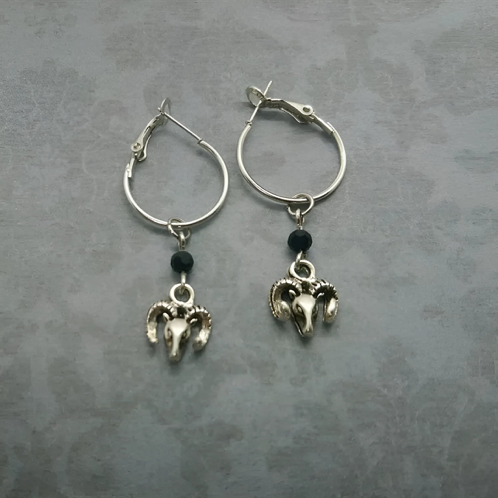 Silver round ring earrings with Tibetan antelope design, European American style alloy construction