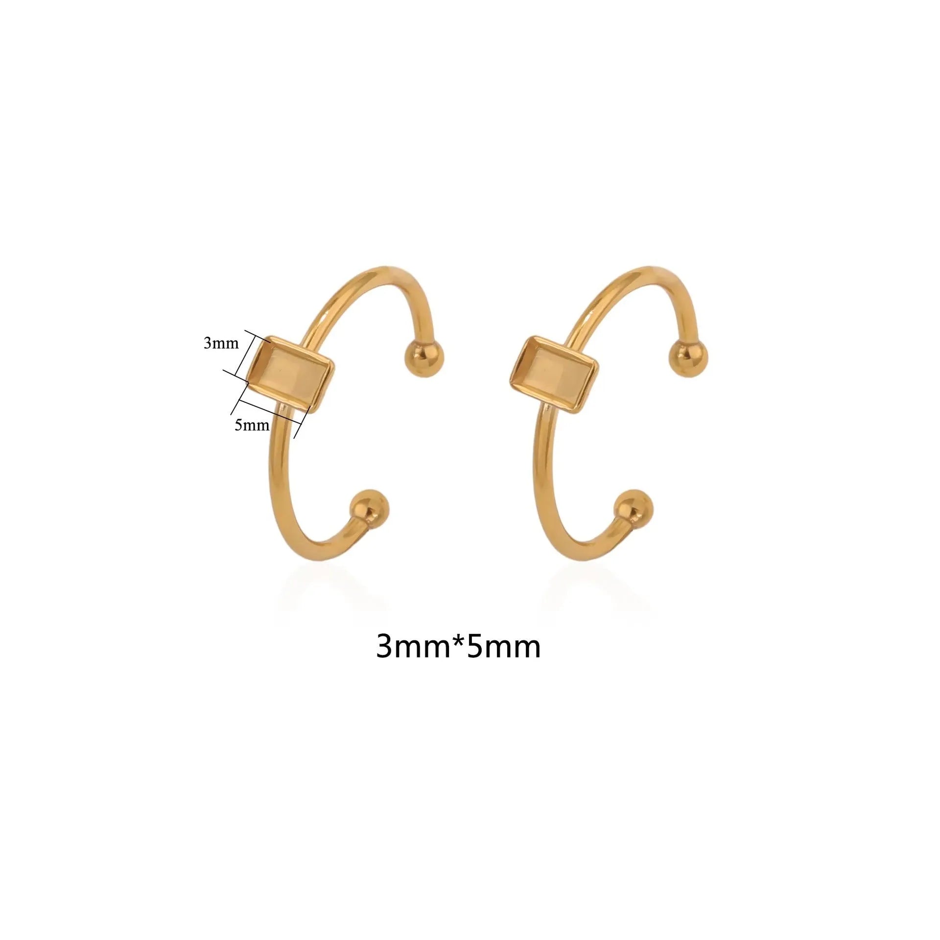 Assortment of golden stainless steel DIY jewellery settings in oval, heart, round, square, and rectangle shapes with totem pattern.