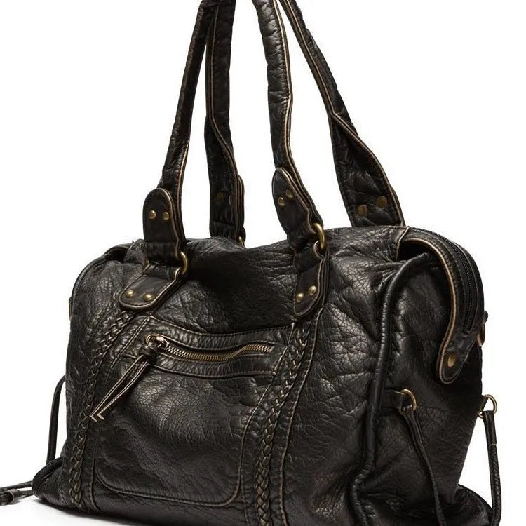 Women's brown retro soft PU messenger bag with woven detail and a single shoulder strap