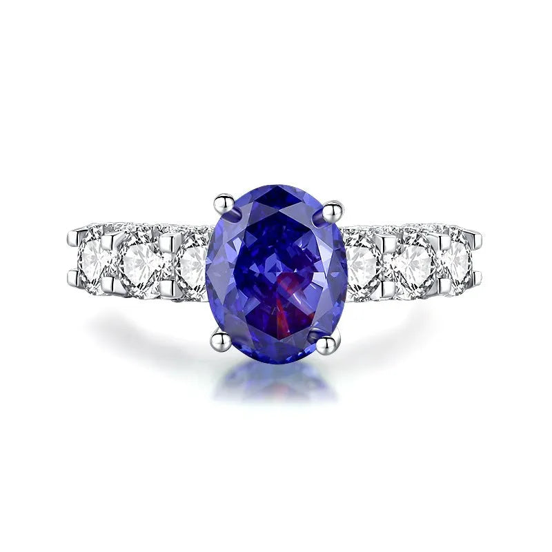 925 sterling silver ring with a heart-shaped Tanzanite colour zircon stone in an ice flower cut.
