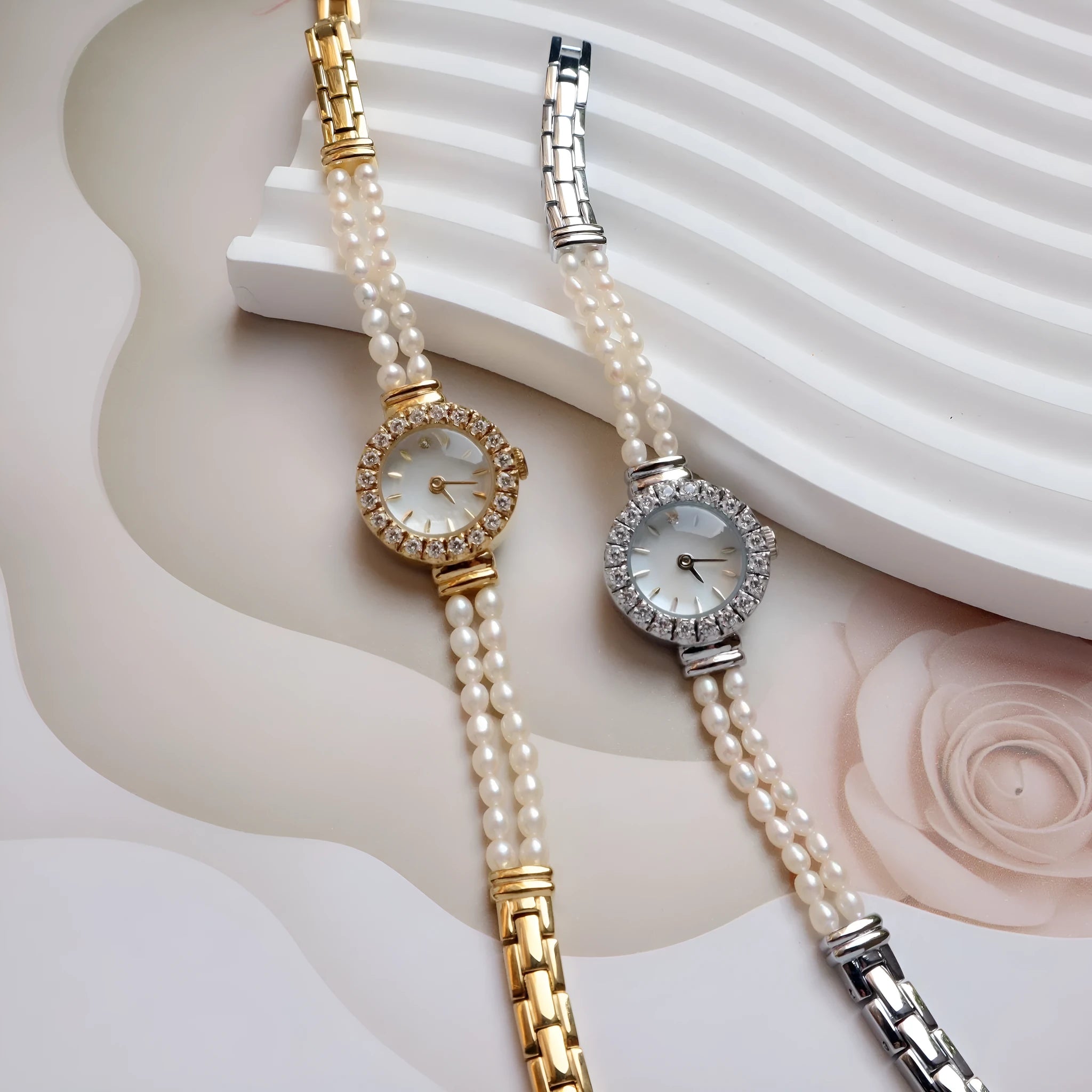 Women's light gold freshwater pearl bracelet watch with round dial and stainless steel strap