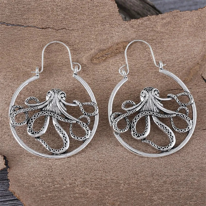 Vintage octopus earrings in antique silver finish with retro design details on zinc alloy