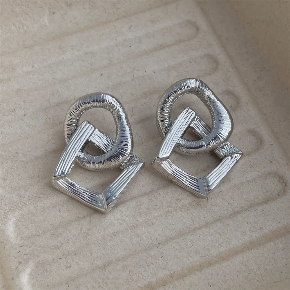 3.4cm copper circle pendant earrings with geometric design in gold or silver electroplated finish