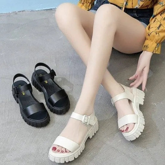 Women's beige peep toe platform sandals with ankle-strap buckle on foot