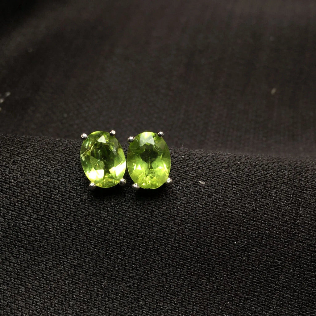 Natural grass green olivine stud earrings with geometric S925 silver setting and 6×8mm faceted stone