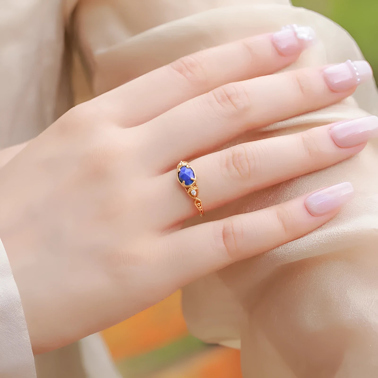 Women's Japanese minimalist lapis lazuli ring with geometric silver alloy setting and ellipse shape