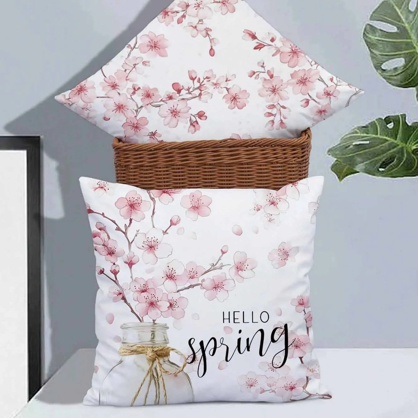 Square short velvet cushion cover with cherry blossom and letter print, 45cm, shown in one of four available colours.