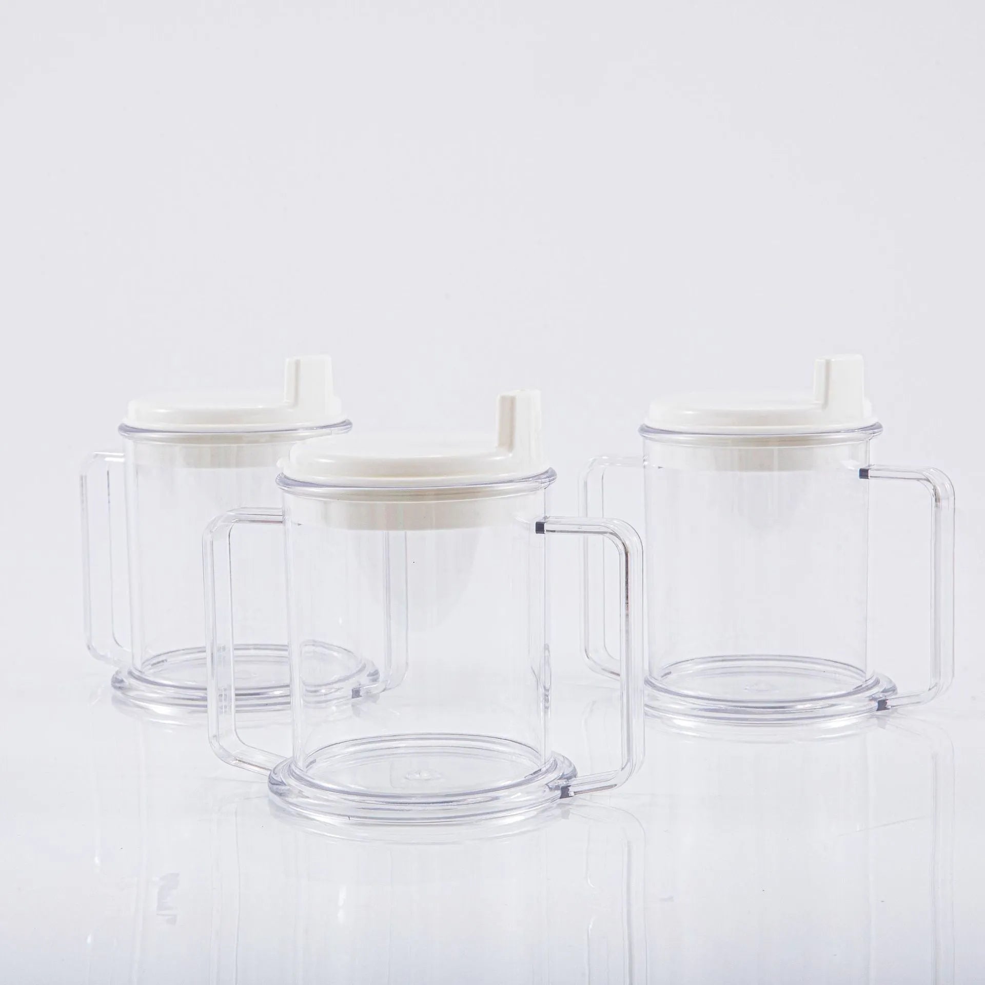 Transparent spill-proof drinking cup showing modern minimalist design