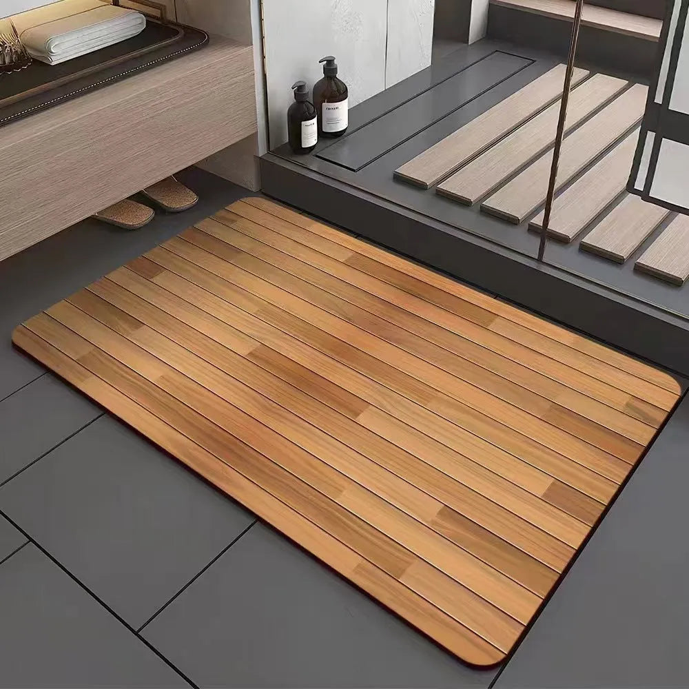 Square diatomite bathroom floor mat with wood grain geometric pattern in a bathroom setting.