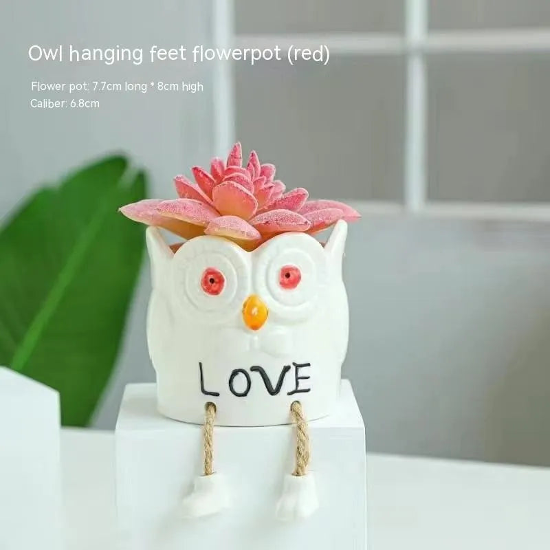 Ceramic hanging foot flowerpot with cartoon design in one of twelve colour variants for succulent plants
