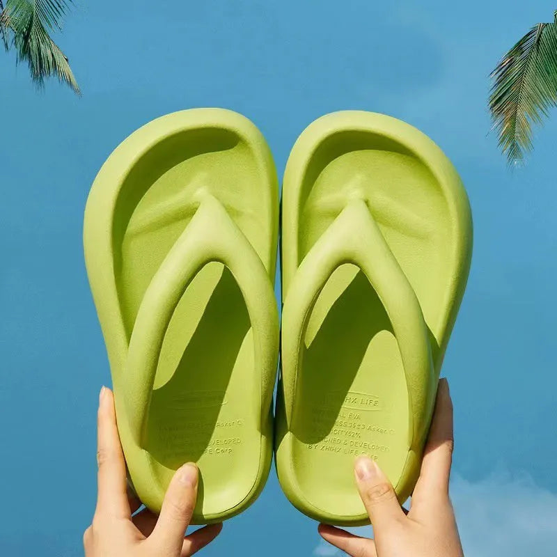 Solid colour thick-soled EVA flip-flops with decorative bow on strap.