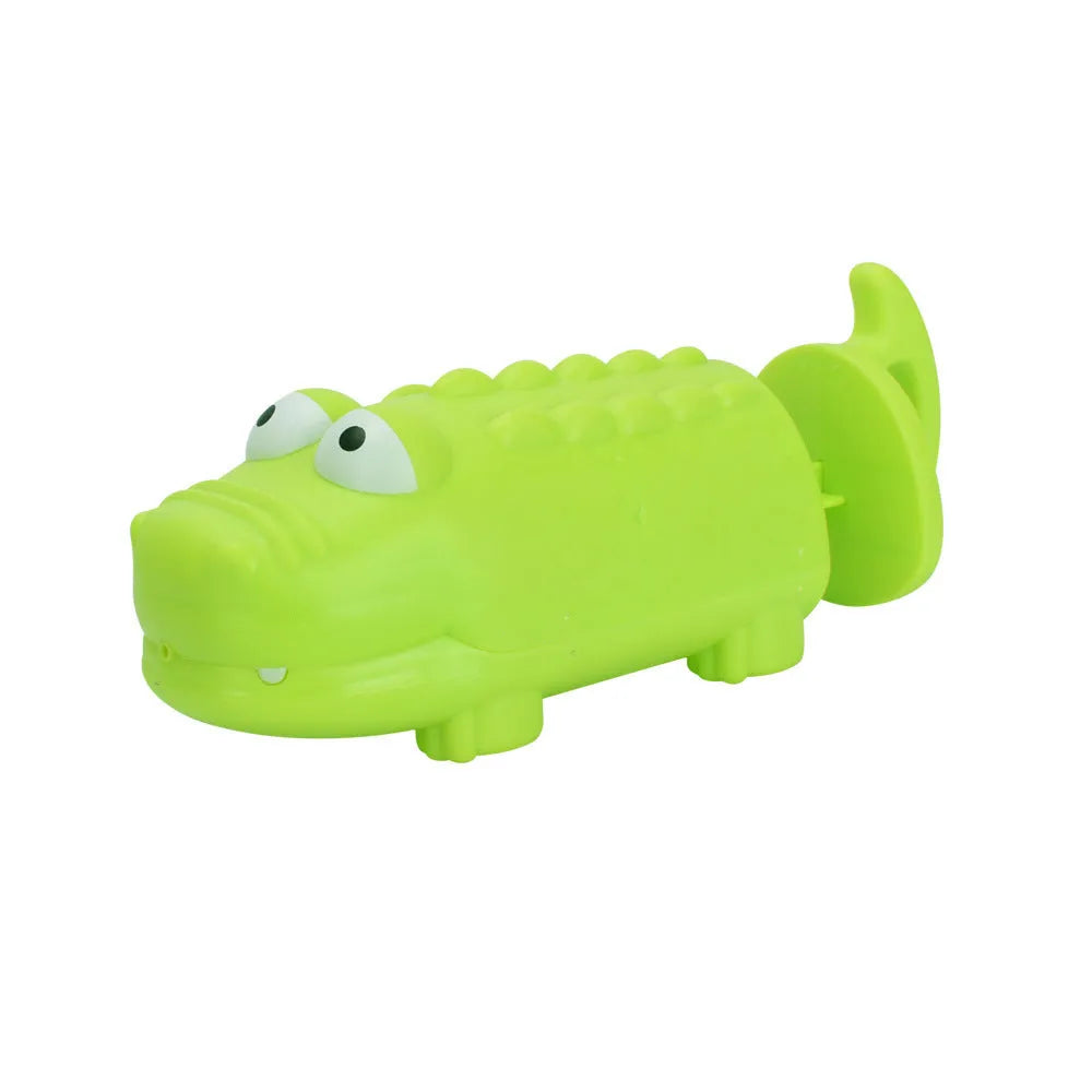 Children's plastic dinosaur water gun bath toy in blue, green, orange, pink, or sky blue on white background