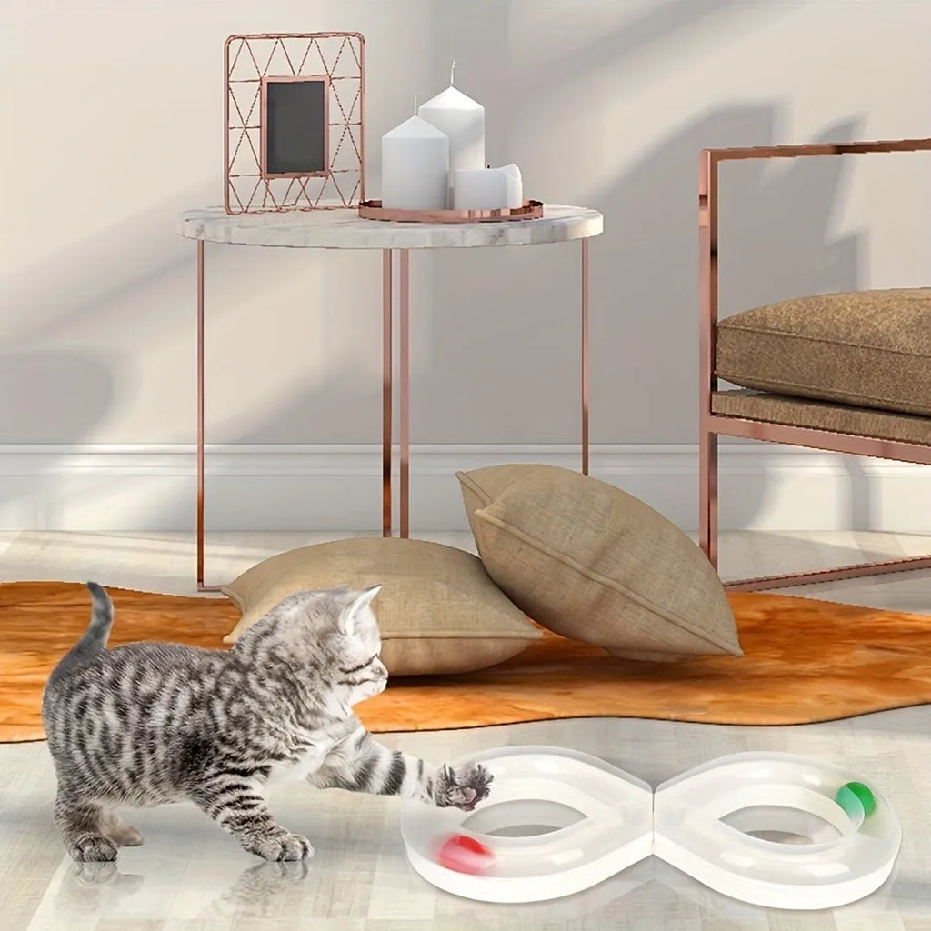 Blue and white interactive cat play station with turntable track, ball, and feather teaser stick.
