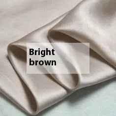 Reversible solid colour silk duvet cover shown in lotus pink, double-sided design.