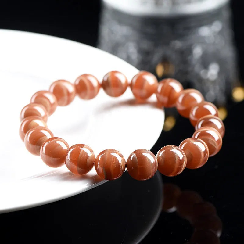 Natural old mine rhodochrosite round beads bracelet with manganese spar construction