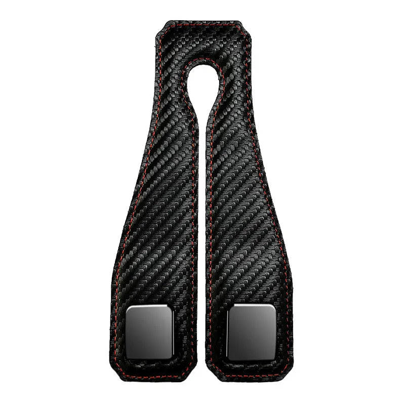 Black carbon fibre metal car hook clipped to headrest with 25kg load capacity