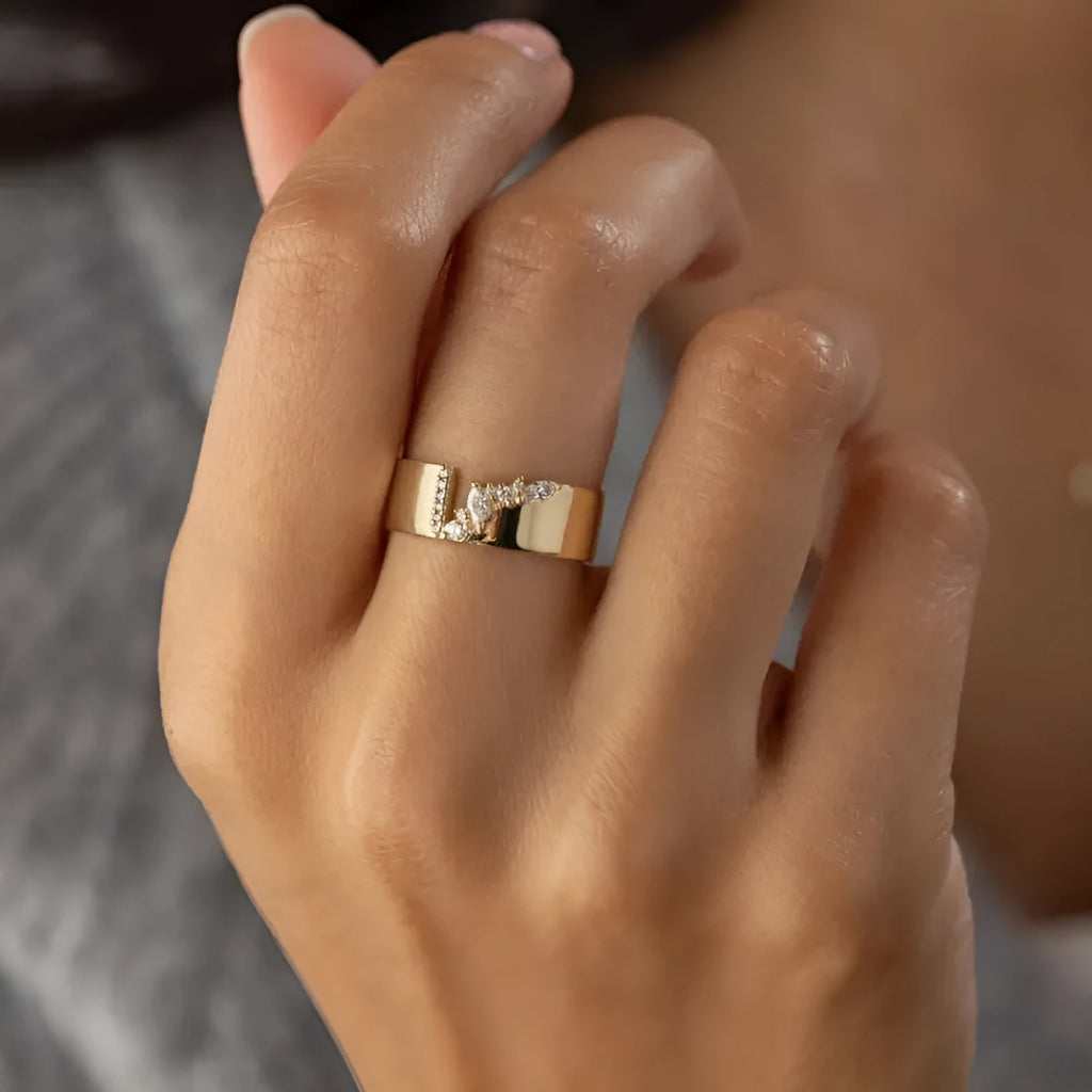 Women's gold electroplated copper ring with shining zircon detail showing personality style design