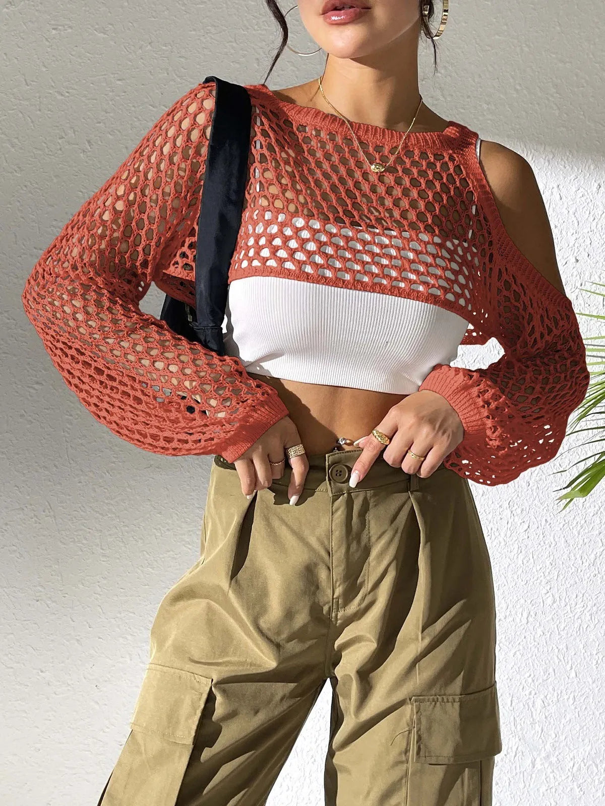 Mesh beach shirt with navel hollowed design in polypropylene fabric, available in six colours