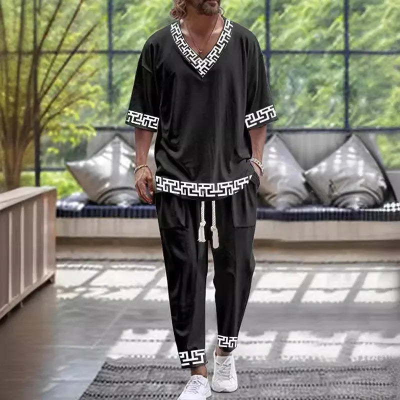 Man's thin polyester tracksuit set with V-neck cropped sleeve jacket and matching trousers