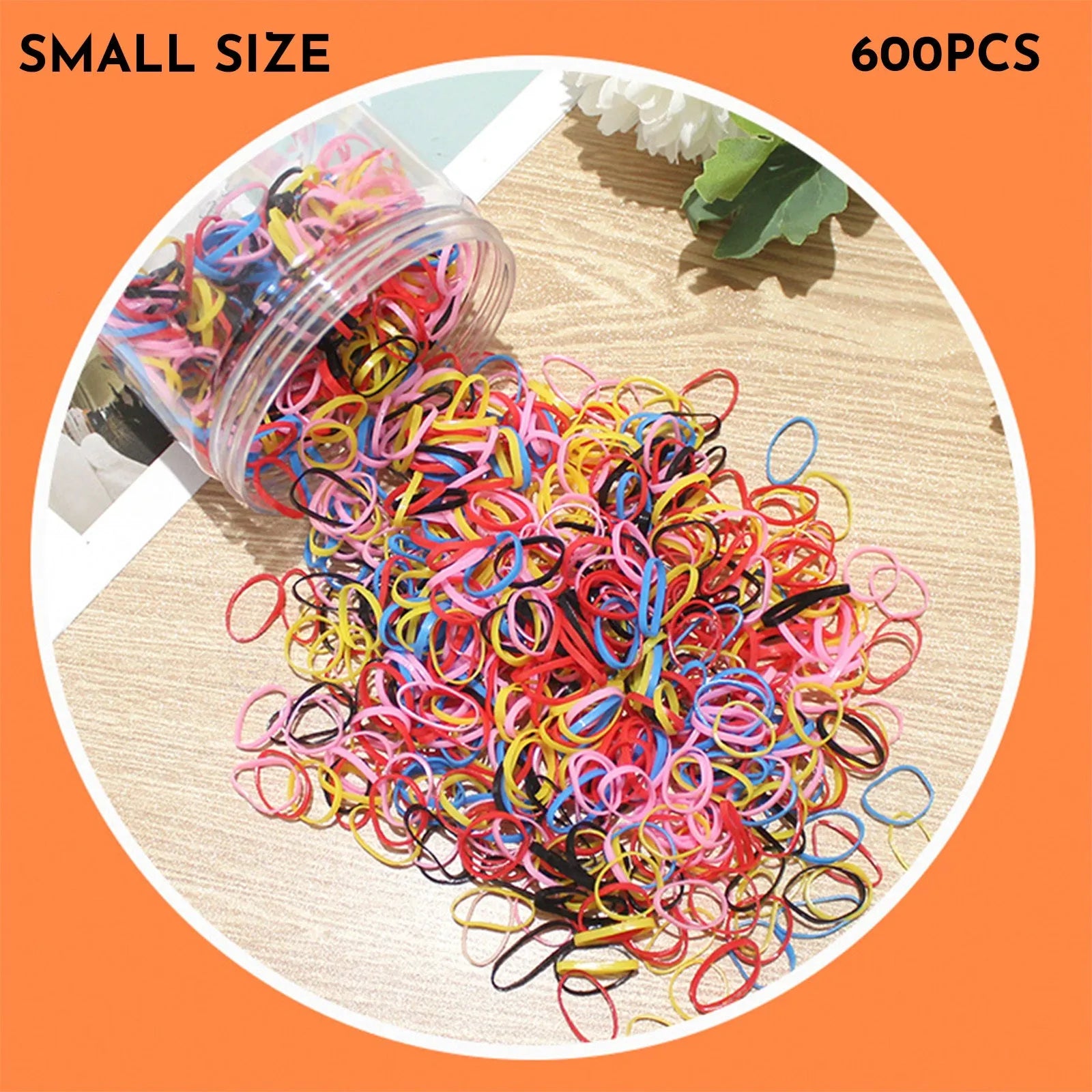 Open reusable container showing hundreds of thin, colourful TPU baby hair ties for toddlers.
