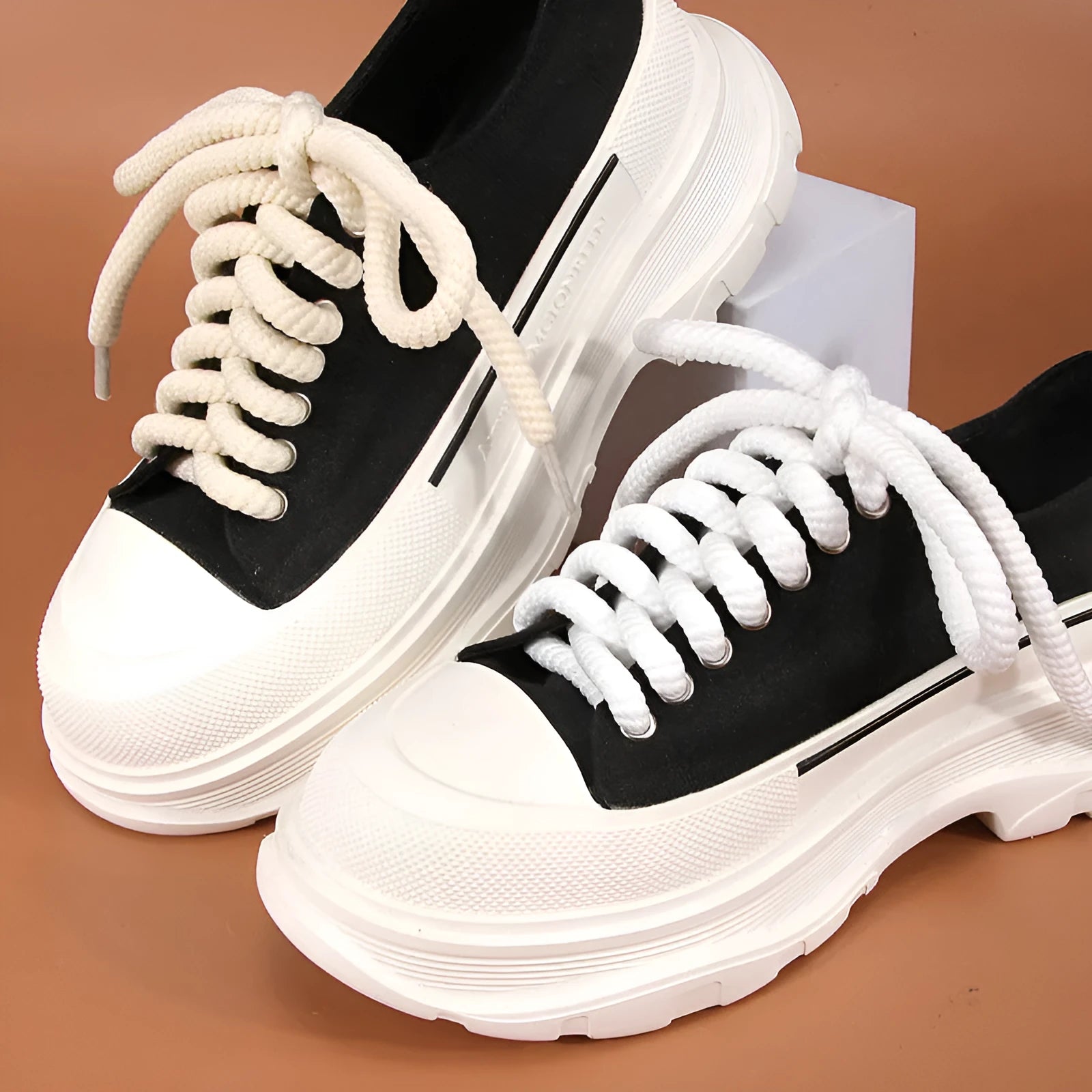 Round woven shoelaces for bread shoes in white, beige and black colours showing length options